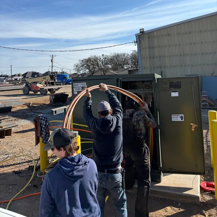 Crew pulling wire for a new electrical service at a steel plant in Hurst